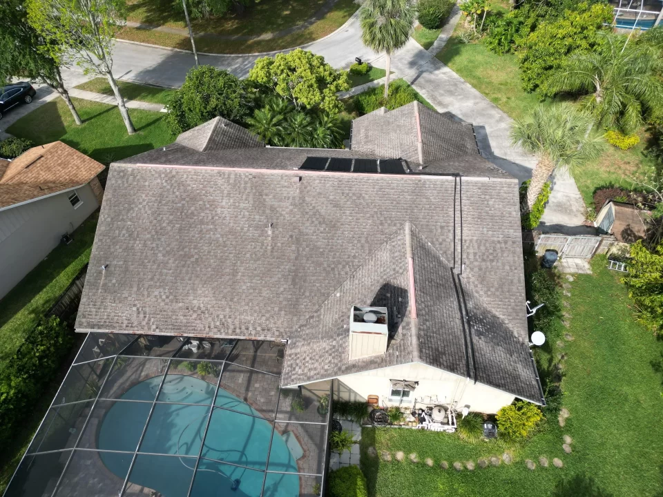 High-quality asphalt shingle roof with solar panels in Valrico.