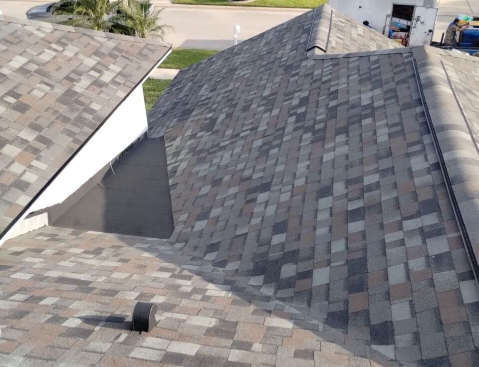 Multi-tonal architectural shingles on a renovated Valrico house roof.